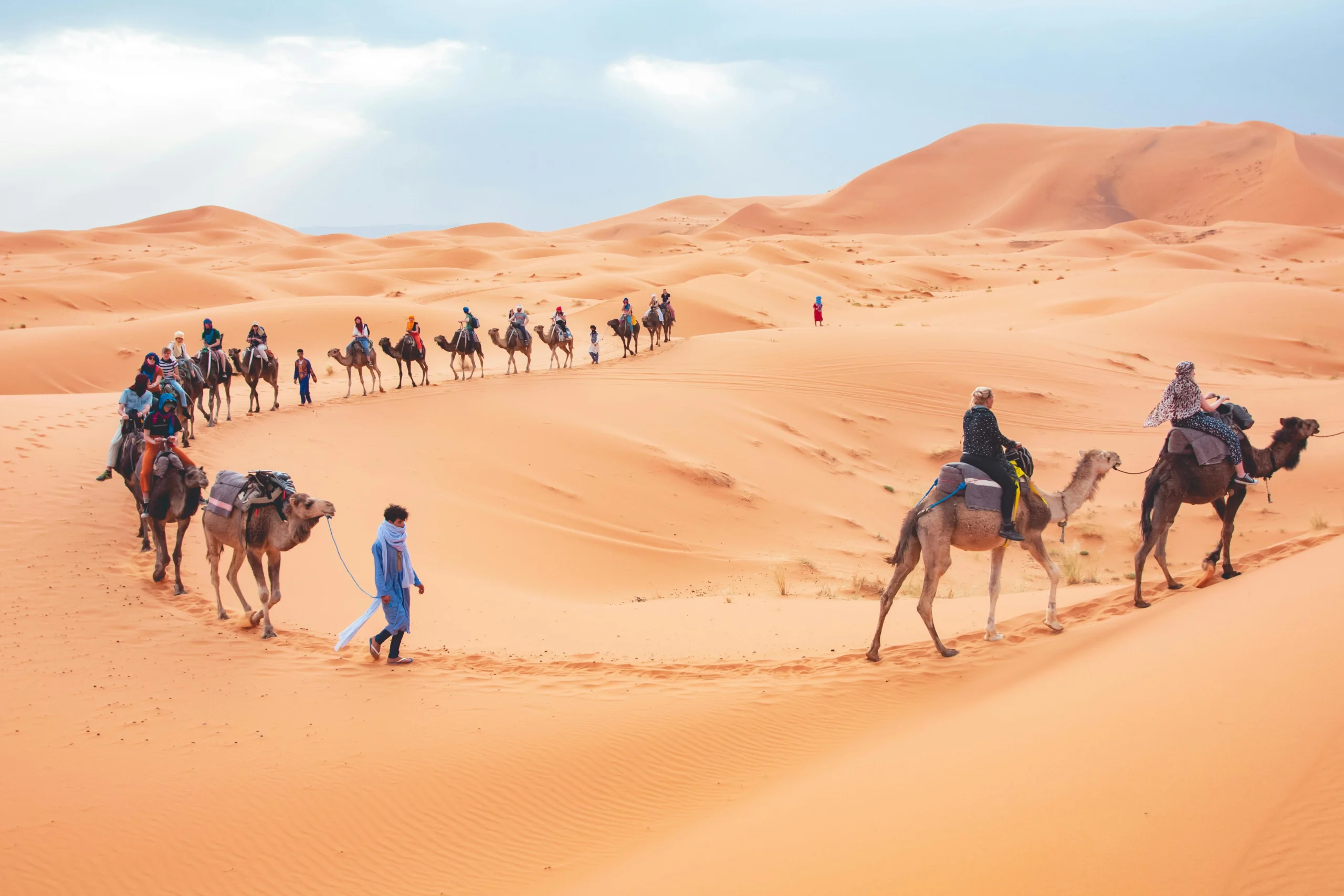 a camel ride and a stay in luxury desert camp nestled in the Erg Chebbi dunes during a curated 3 days Marrakech to Fes desert tour.