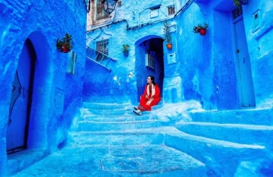A quiet blue alley in Chefchaouen, the first highlight of the 8 Days Tour from Tangier to marrakech